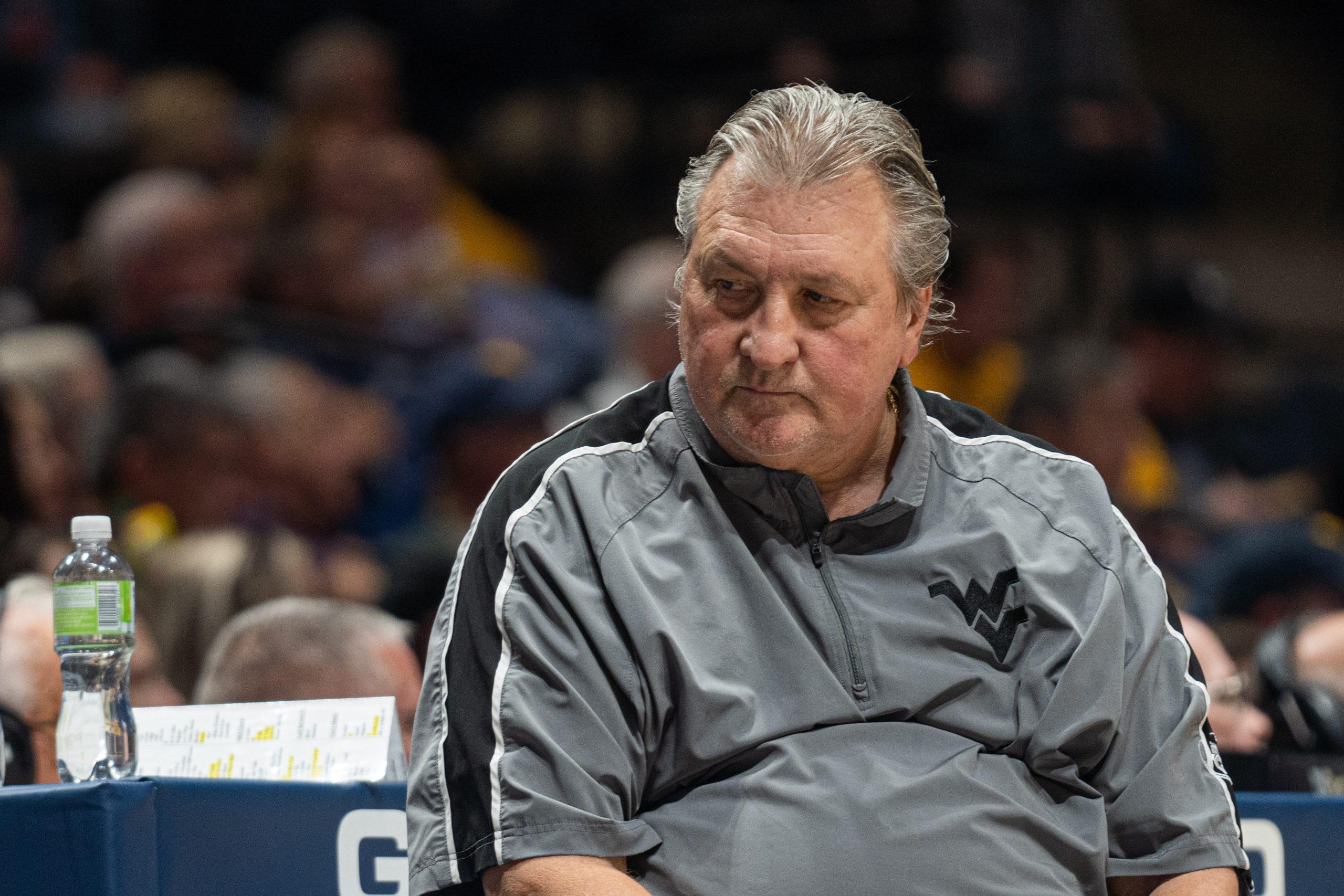 Huggins' amended deal will not pay him a buyout if his services are not retained by WVU